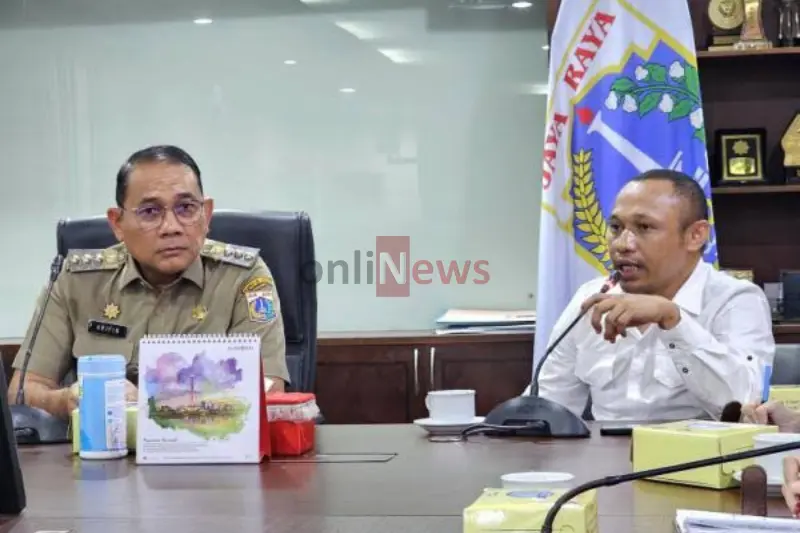 Kepala Kanwil KemenHAM DK Jakarta, Mikael Azedo Harwito, bersama Walikota Jakarta Pusat, Arifin, dalam audiensi penguatan HAM dan sosialisasi aplikasi PRISMA di Kantor Walikota Jakarta Pusat.