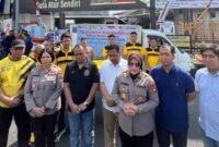 Polda Lampung bersama Perum Bulog Kanwil Lampung menjual beras SPHP 2,2 ton kepada warga di Tugu Adipura, Bandar Lampung, Minggu (10/8/2025). (Dok-Polri)